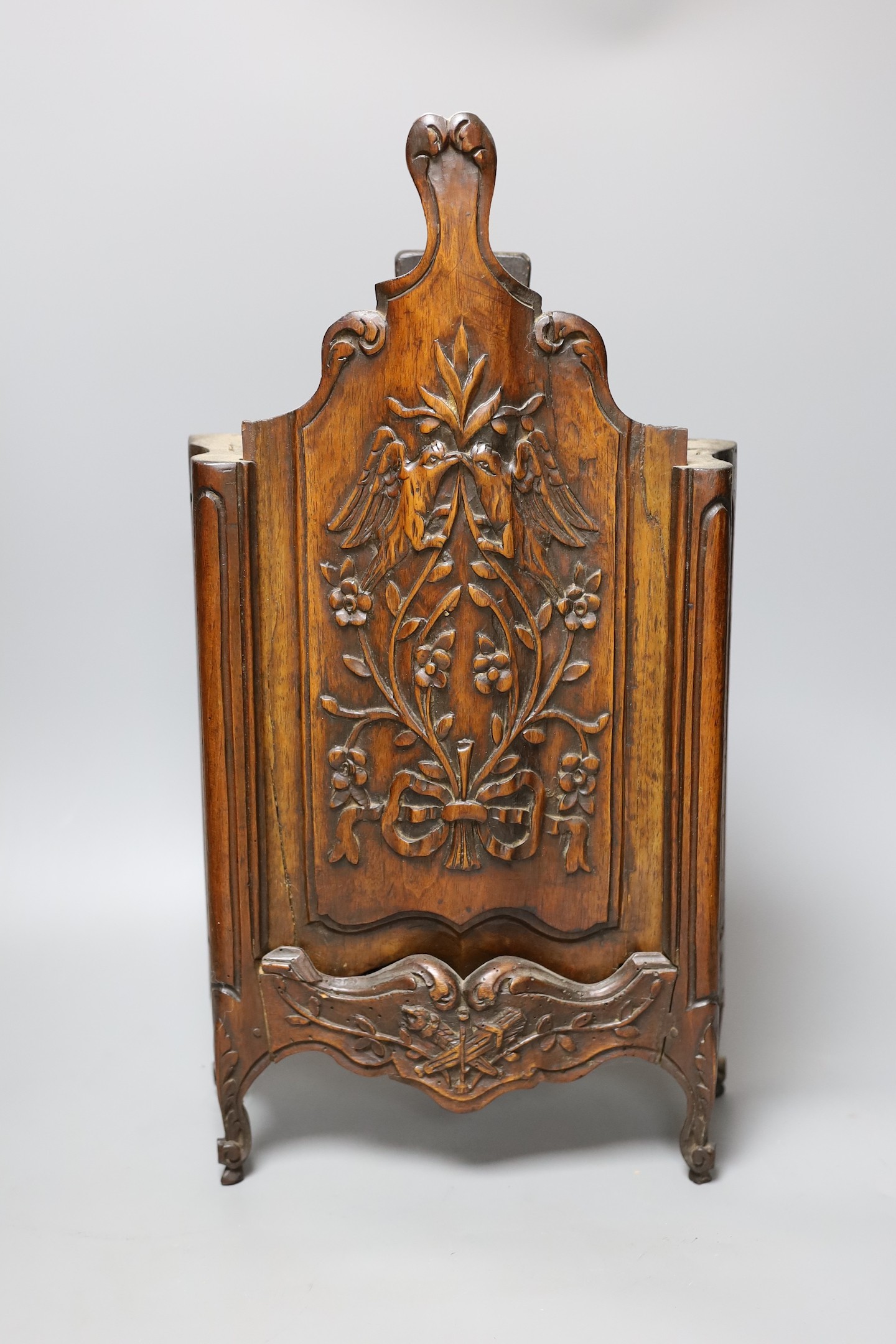 A carved novelty 'Armoire' candle box, 50 cms high